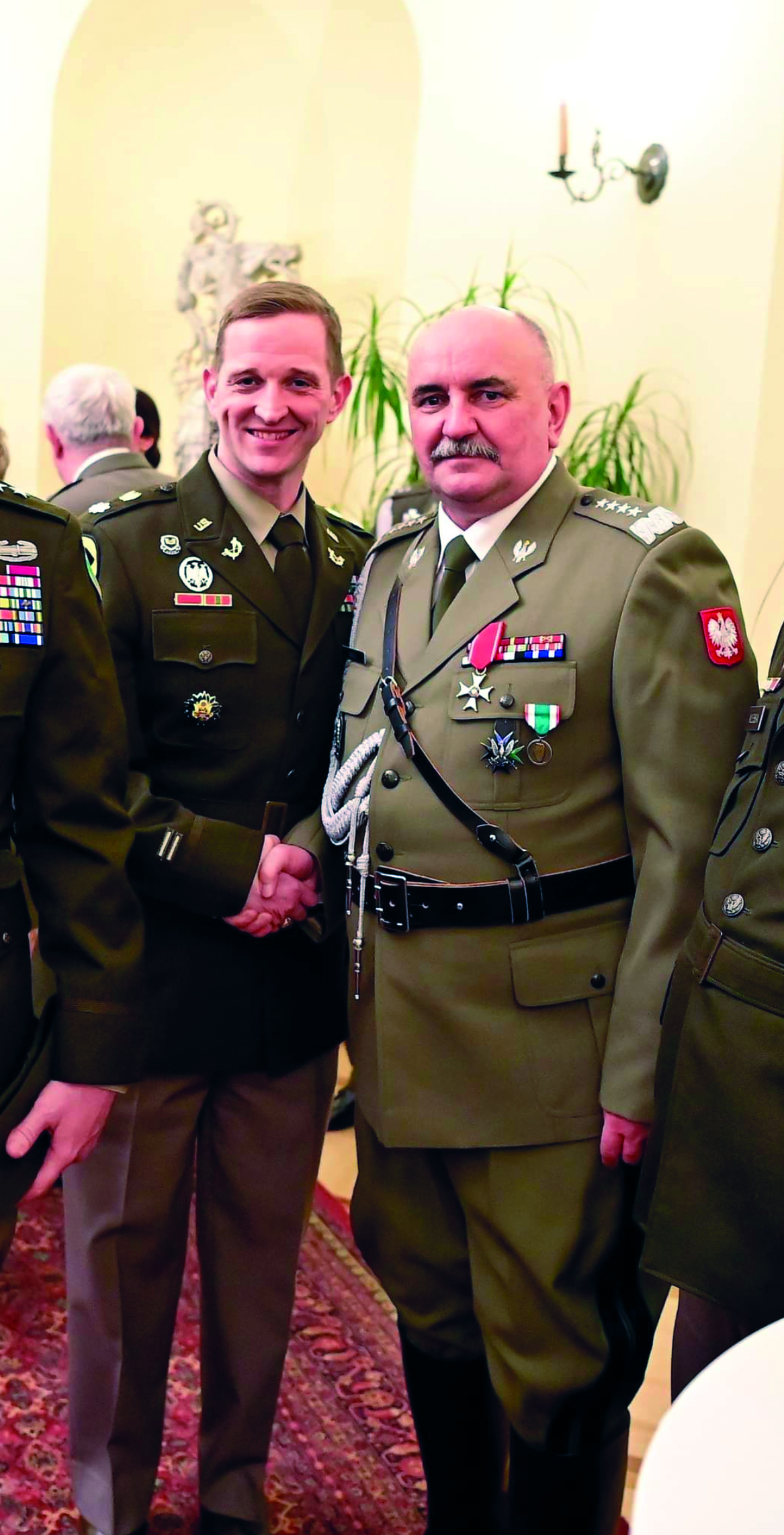 LTC Robert N. Michaels and GEN (Ret.) Jaroslaw
        Mika at GEN Mika’s retirement reception in
        Warsaw. GEN Mika was a staunch supporter of
        interoperability initiatives with the U.S. military
        and was critical to establishing LTC Michaels’
        position in his headquarters. GEN Mika also
        directed the full integration of the U.S. Army MPEP
        into discussions within the Polish government
        regarding Poland’s military assistance mission to
        Ukraine and the applicability of international law.
        (Photo courtesy of authors)